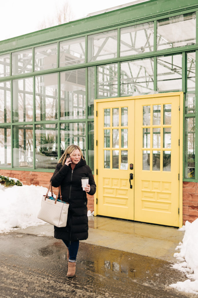 Park City, Utah real estate agent photoshoot outside of a greenhouse in the winter - Becca Hofmann Photography