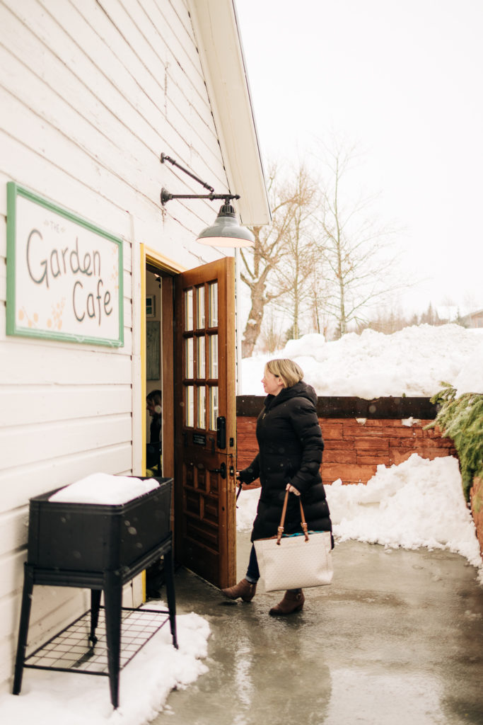 Park City, Utah real estate agent photoshoot going into a coffee shop in winter - Becca Hofmann Photography